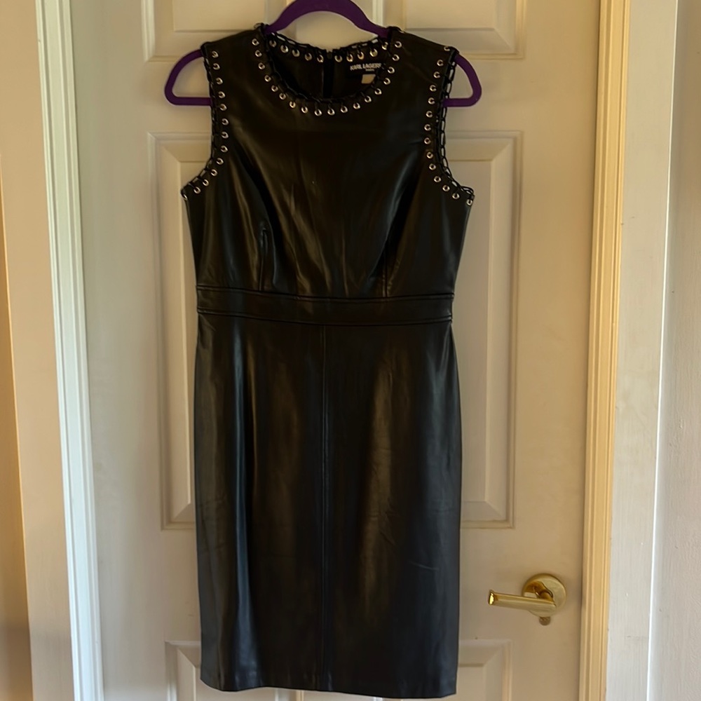 Leather dress slightly distressed from storage only inside near neck